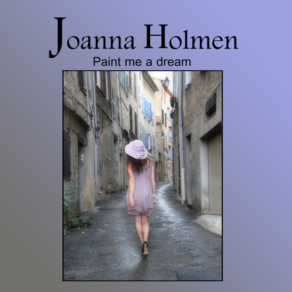 Kvinde i lyserød kjole og bredskygget hat går bort ned ad en smal, regnvåd sydeuropæisk gyde. Cover til singlen Paint me a dream