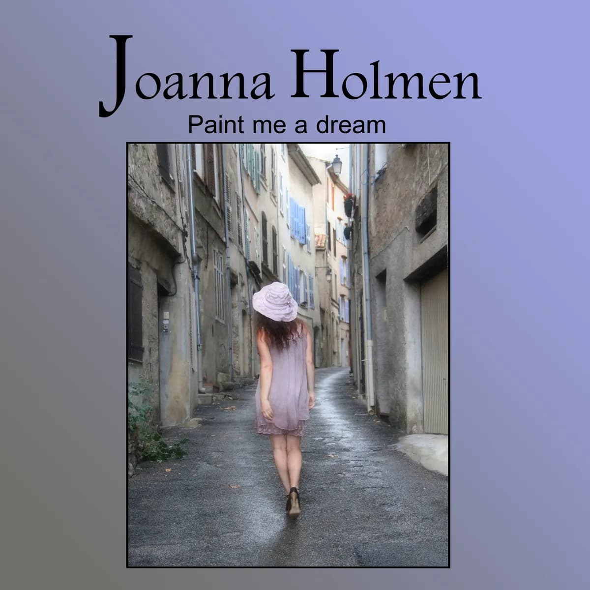 Kvinde i lyserød kjole og bredskygget hat går bort ned ad en smal, regnvåd sydeuropæisk gyde. Cover til singlen Paint me a dream